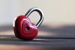 BeLoveCurious Why Curiosity is the key to love - A red heart shaped lock to represent Why curiosity is the key to finding love - BeLoveCurious